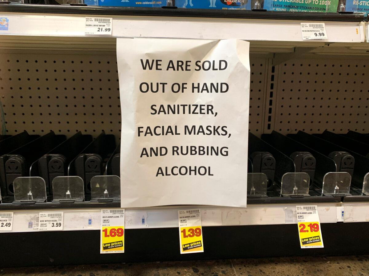 A sign advising of out-of-stock sanitizer, facial masks and rubbing alcohol is seen at a store following warnings about COVID-19 in Kirkland, Washington on March 5, 2020. (Jason Redmond/AFP via Getty Images)