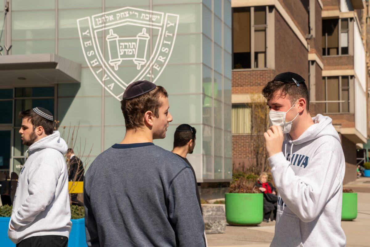 A Yeshiva University student wears a face mask on the grounds of the university in New York City on March 4, 2020. (David Dee Delgado/Getty Images)