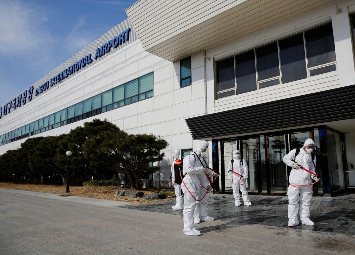 South Korean soldiers carry out disinfection work at the international airport amid the rise in confirmed cases of coronavirus disease (COVID-19) in Daegu, South Korea, on March 6, 2020. (Kim Kyung-Hoon/Reuters)