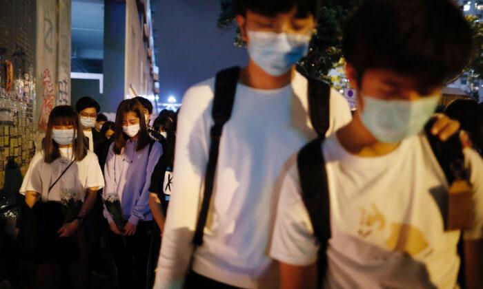 Hong Kong Pro-Democracy Protesters Hold Vigil to Mourn Student’s Death
