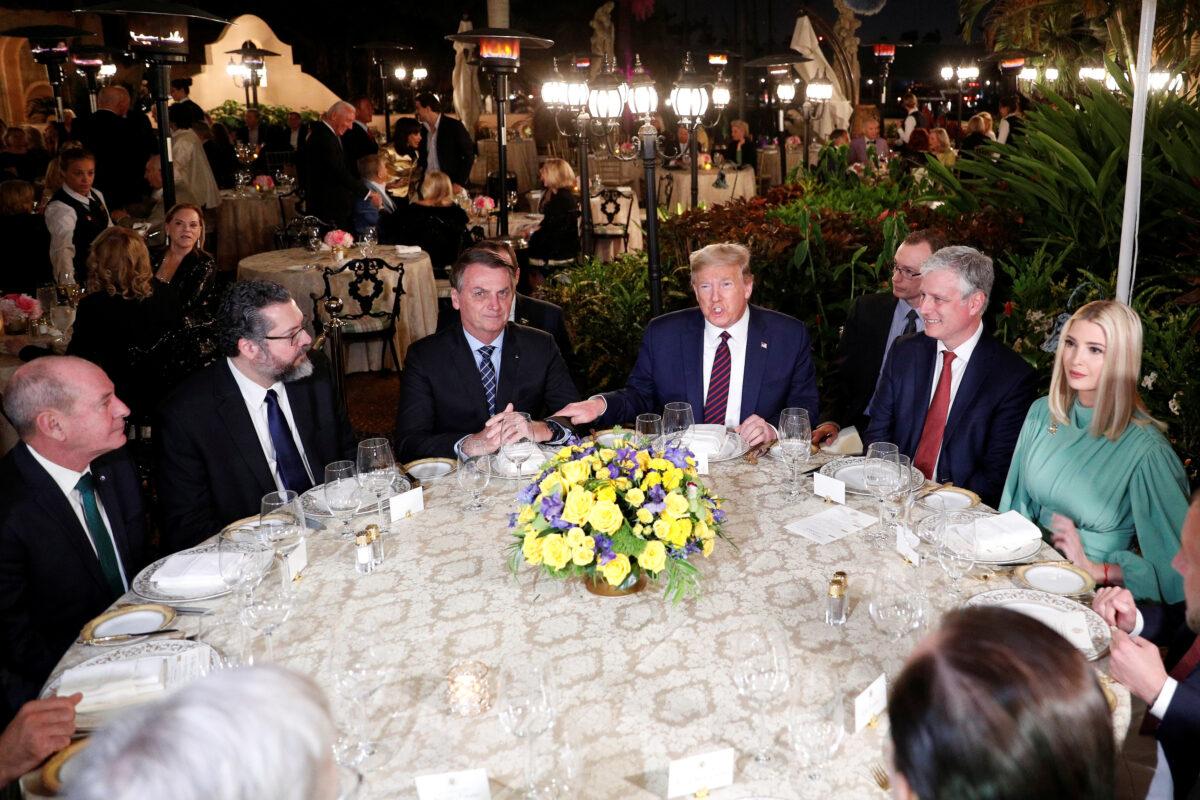 President Donald Trump hosts a working dinner with Brazilian President Jair Bolsonaro at the Mar-a-Lago resort in Palm Beach, Fla., on March 7, 2020. (Tom Brenner/Reuters)