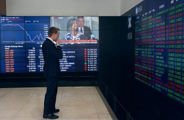 A man stands in the viewing gallery at the Australian Stock Exchange in Sydney, Australia, on March 9, 2020. (Rick Rycroft/AP Photo)
