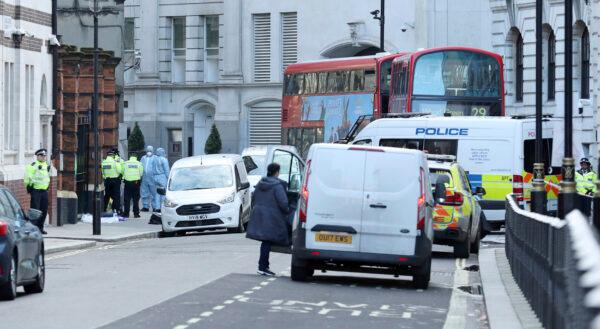 Police activity in Great Scotland Yard, in Whitehall, central London, near the area of an incident, in Whitehall, London, UK., on March 9, 2020. (Yui Mok/PA via AP)