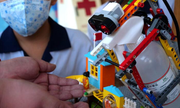 Taiwan Students Fight Virus With Lego Disinfectant Dispenser
