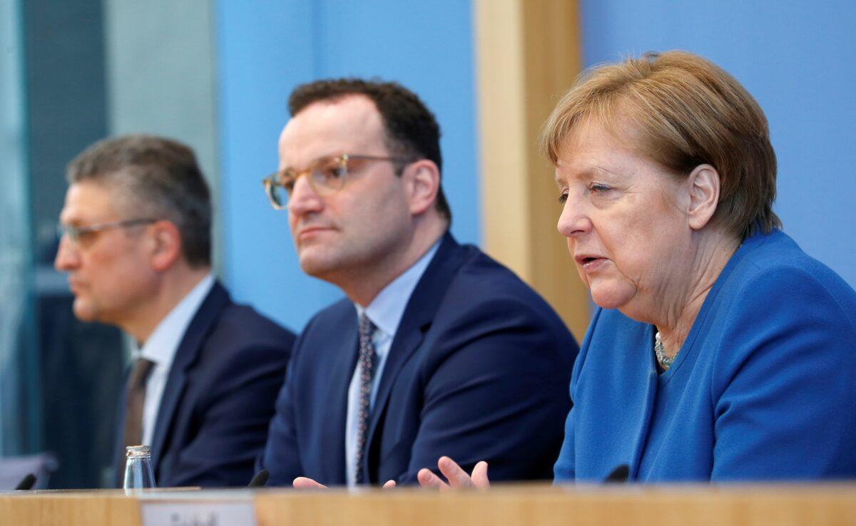 German Chancellor Angela Merkel, Health Minister Jens Spahn, and head of the Robert Koch Institute Lothar Wieler address a news conference on coronavirus in Berlin, Germany, March 11, 2020. (Michele Tantussi/Reuters)
