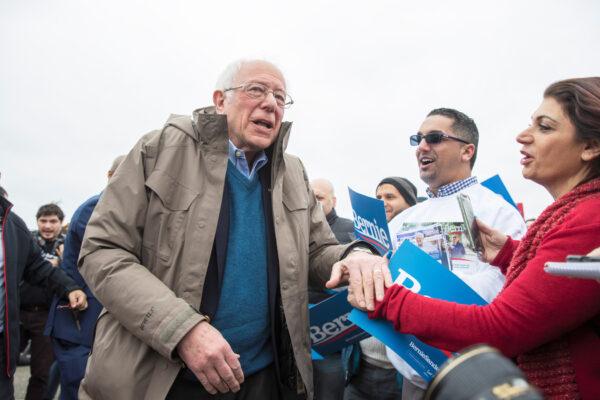 U.S. Democratic presidential candidate Bernie Sanders greets supporters outside a polling station in Dearborn Heights, Michigan, on March 10, 2020. (Lucas Jackson/Reuters)