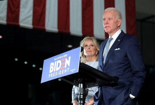 Democratic U.S. presidential candidate and former Vice President Joe Biden speaks with his wife Jill at his side during a primary night news conference at The National Constitution Center in Philadelphia, Pennsylvania, on March 10, 2020. (Brendan McDermid/Reuters)