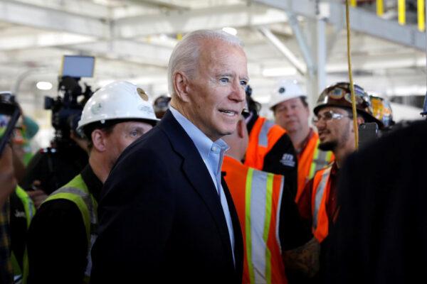 Democratic U.S. presidential candidate and former Vice President Joe Biden greets workers during a campaign stop at the Fiat Chrysler Automobiles Mack Assembly plant in Detroit, Michigan, on March 10, 2020. (Brendan McDermid/Reuters)