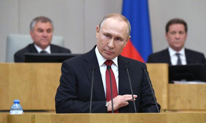 Putin Backs Term-Limit Freeze Allowing Him to Stay in Office