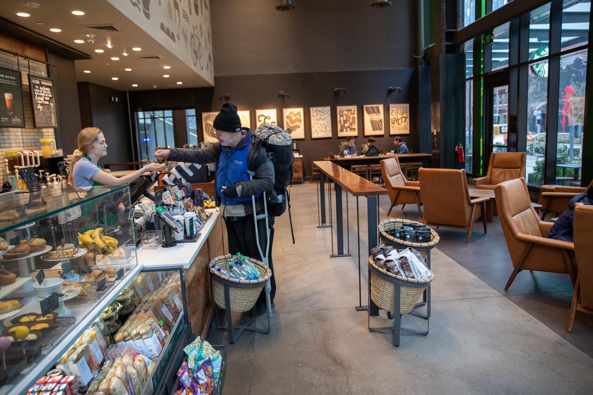 A Starbucks coffee shop sits mostly empty at Amazon headquarters in downtown Seattle, Washington, on March 10, 2020. (John Moore/Getty Images)
