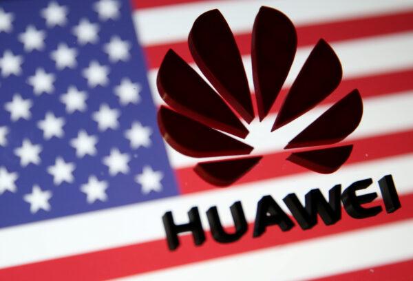 A 3D printed Huawei logo is placed on glass above displayed U.S. flag in this illustration taken on Jan. 29, 2019. (Dado Ruvic/Illustration/Reuters)