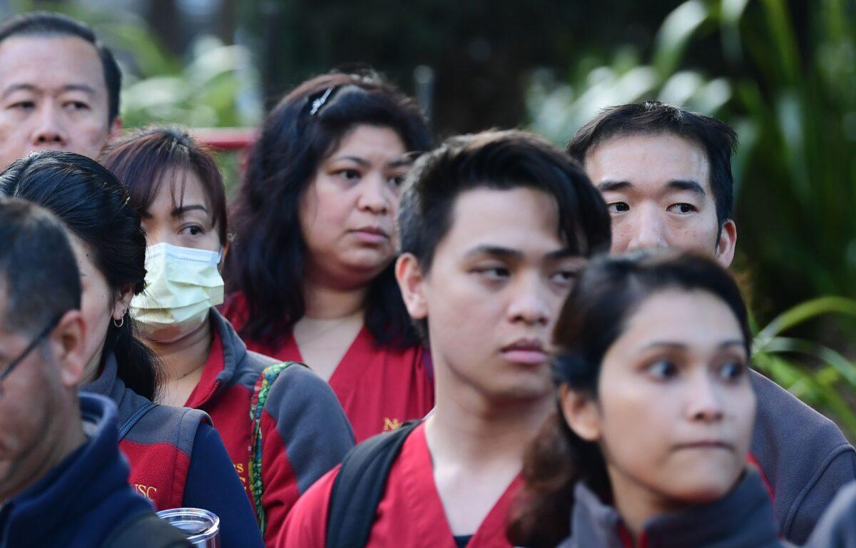 Registered Nurses and Healthcare workers participate in a day of action rally over the new coronavirus at the USC Keck Hospital in Los Angeles, California, on March 11, 2020. (Frederic J. Brown/AFP via Getty Images)