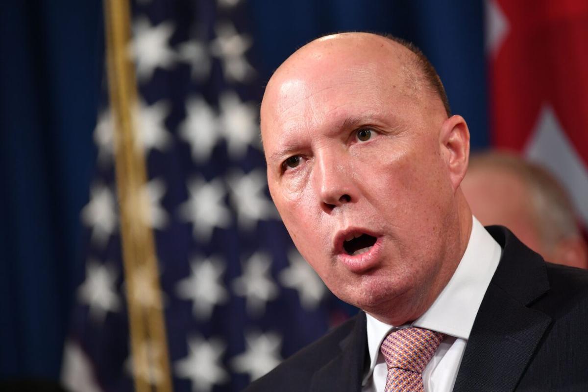 Australia's Minister for Home Affairs Peter Dutton announces measures against online sexual exploitation during a press conference at the Department of Justice in Washington on March 5, 2020. (Mandel Ngan/AFP via Getty Images)