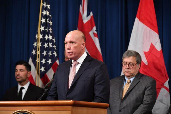 Australia's Minister for Home Affairs Peter Dutton announces measures against online sexual exploitation during a press conference at the Department of Justice in Washington on March 5, 2020. (MANDEL NGAN/AFP via Getty Images)