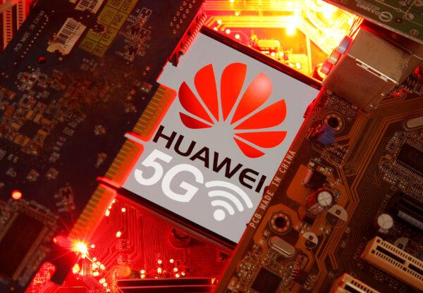 A smartphone with the Huawei and 5G network logo is seen on a PC motherboard in this illustration picture taken on Jan. 29, 2020. (Dado Ruvic/Illustration/Reuters)