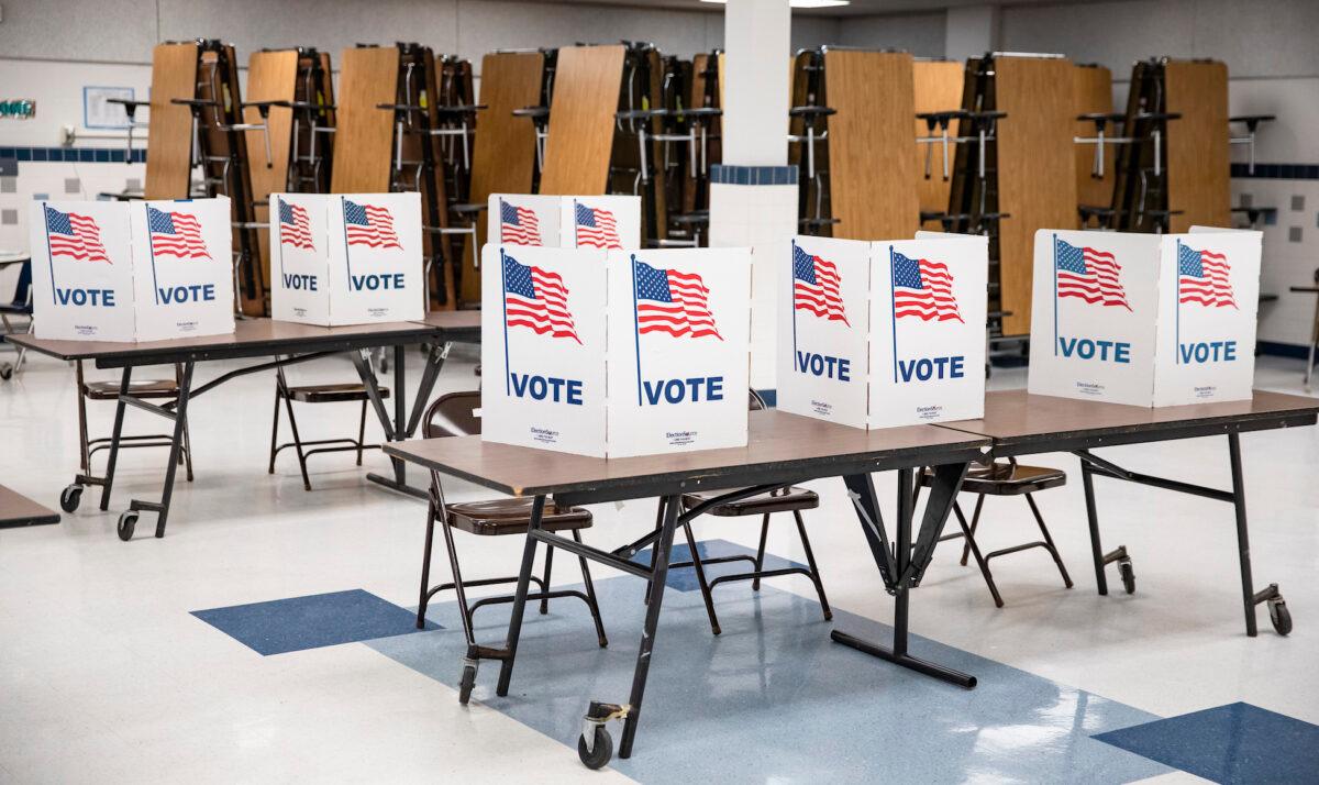 Voting booths in Arlington, Va., on March 3, 2020. (Samuel Corum/Getty Images)