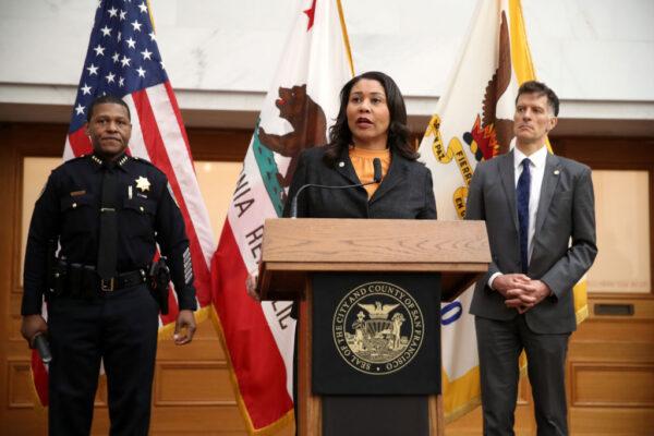 San Francisco Mayor London Breed (C) speaks during a press conference as San Francisco police chief William Scott (L) and San Francisco Department of Public Health director Dr. Grant Colfax (R) look on at San Francisco City Hall on March 16, 2020 in San Francisco, California. (Photo by Justin Sullivan/Getty Images)