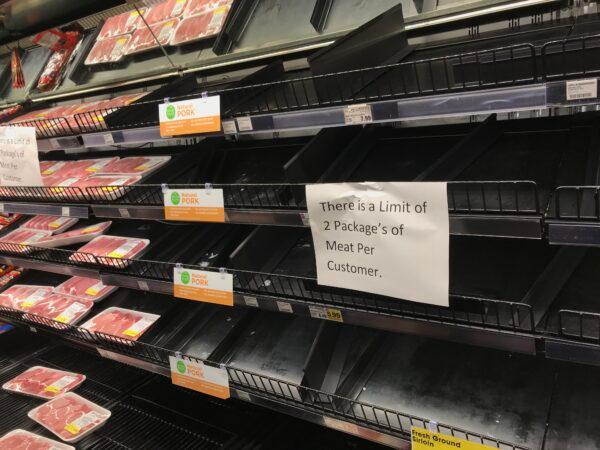 Packages of meat limited to two items per customer at Ralphs in Menifee, Calif., on March 15. 2020. (Brad Jones/The Epoch Times)