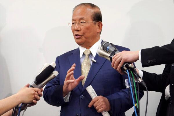 Toshiro Muto, CEO of the Tokyo 2020 Organizing Committee, answers questions during a news conference in Tokyo, Japanm on March 17, 2020. (Eugene Hoshiko/AP Photo)