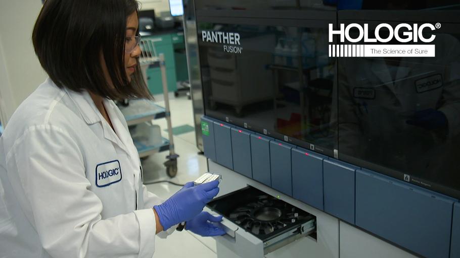 A laboratory technician uses Hologic's new coronavirus test in a file photo. (Hologic via Business Wire)