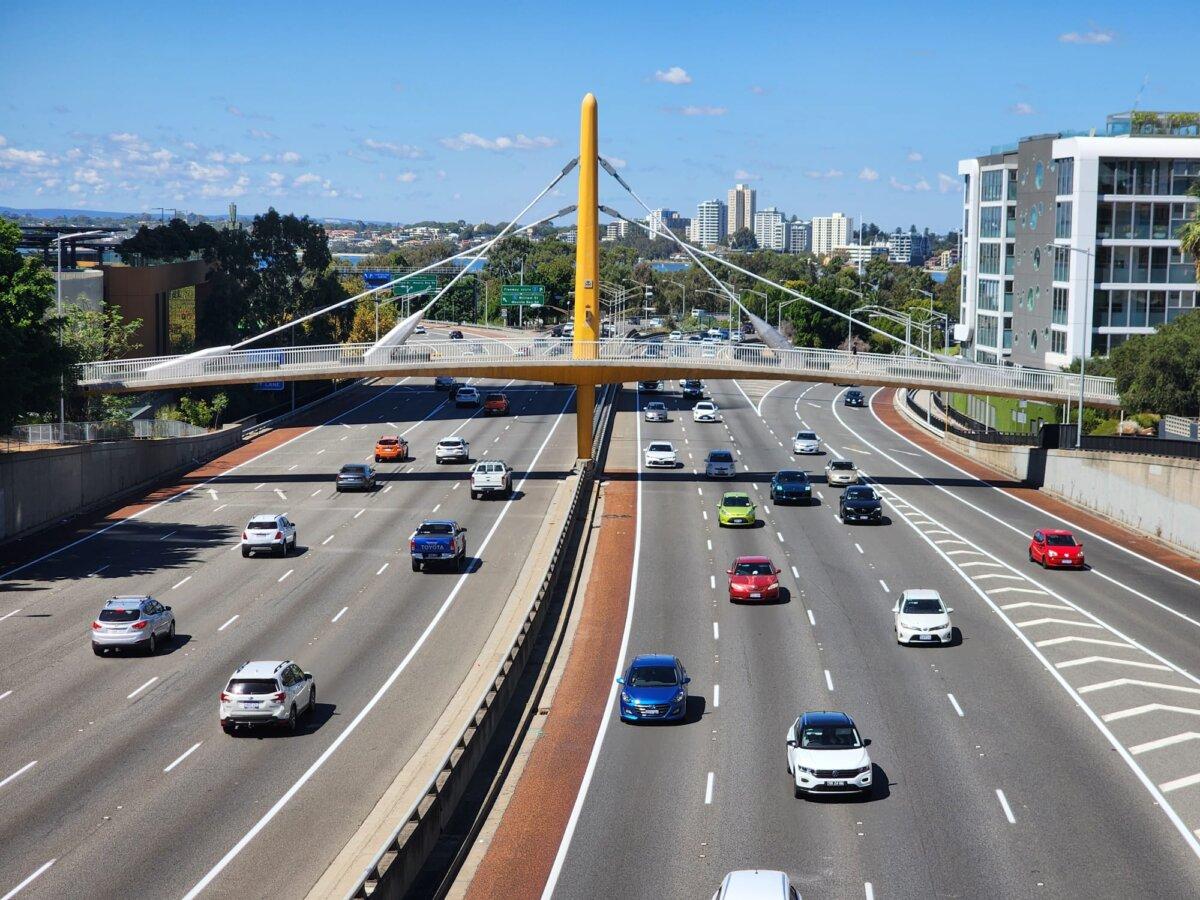 Cars travel on the Mitchell Freeway in Perth, Western Australia, on March 16, 2024. (Susan Mortimer/The Epoch Times)