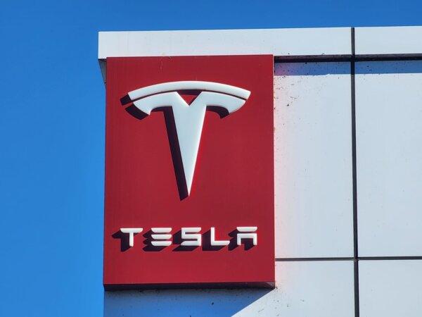 A Tesla logo is seen at a dealership in Perth, Western Australia, on March 16, 2024. (Susan Mortimer/The Epoch Times)