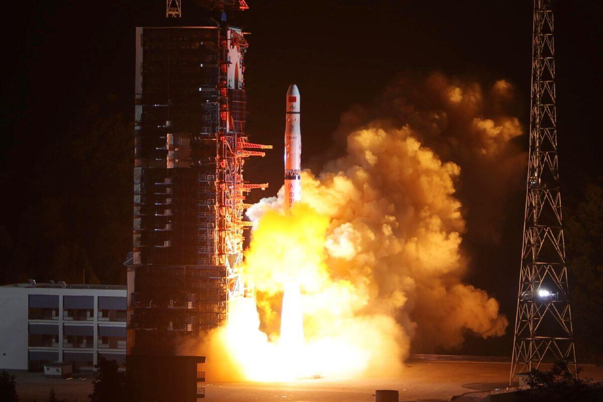 A Long March-4C rocket lifts off from the southwestern Xichang launch center carrying the Queqiao ("Magpie Bridge") satellite in Xichang, Sichuan Province, China, on May 21, 2018. This communications relay satellite allows a rover to send images from the far side of the Moon. (China Out/AFP via Getty Images)