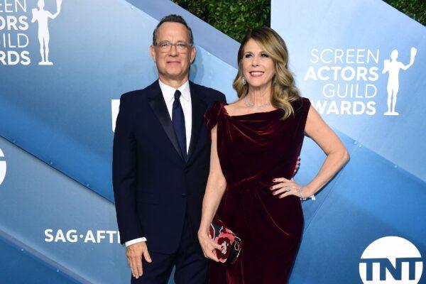 Actor Tom Hanks (L) and wife actress Rita Wilson arrive for the 26th Annual Screen Actors Guild Awards at the Shrine Auditorium in Los Angeles on Jan. 19, 2020. (Frederic J. Brown/AFP via Getty Images)