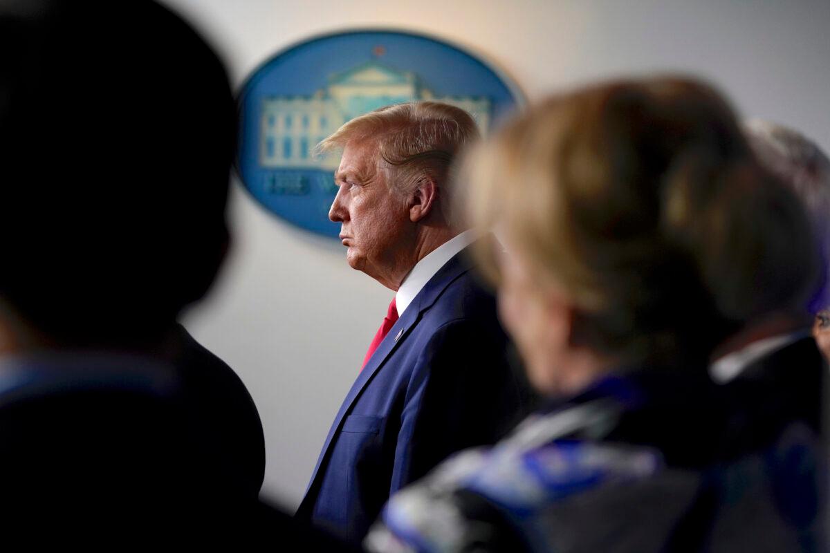  President Donald Trump listens during press briefing with the Coronavirus Task Force at the White House in Washington on March 18, 2020. (Evan Vucci/AP Photo)