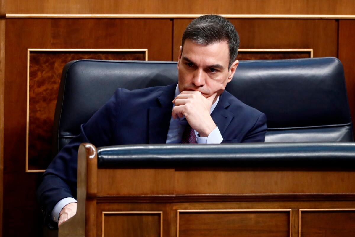Spain's Prime Minister Pedro Sánchez listens during the extraordinary plenary session in Madrid on March 18, 2020. (Mariscal - Pool/Getty Images)