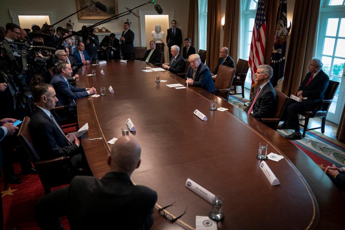 President Donald Trump leads a meeting with travel and tourism industry executives to discuss the economic response to the COVID-19 outbreak in the Cabinet Room of the White House in Washington, on March 17, 2020. (Drew Angerer/Getty Images)