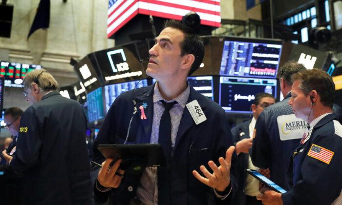 Wall Street Bounces After Monday’s Selloff as Fed Boosts Liquidity