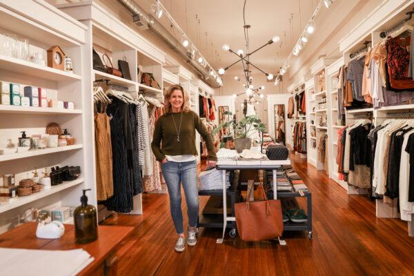 Kim Osborne, manager of women’s fashion store Vernacular, stands in the empty store in the City of Worthington in Columbus, Ohio, on March 17, 2020. (Charlotte Cuthbertson/The Epoch Times)