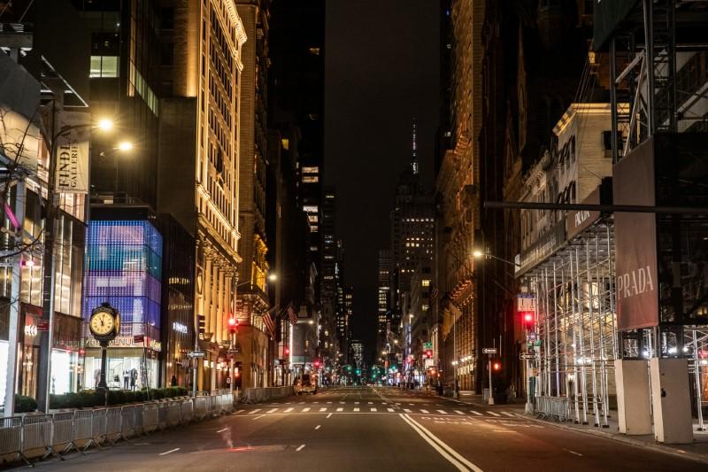 An empty Fifth Avenue is seen following the outbreak of COVID-19 in New York City on March 18, 2020. (Jeenah Moon/Reuters)