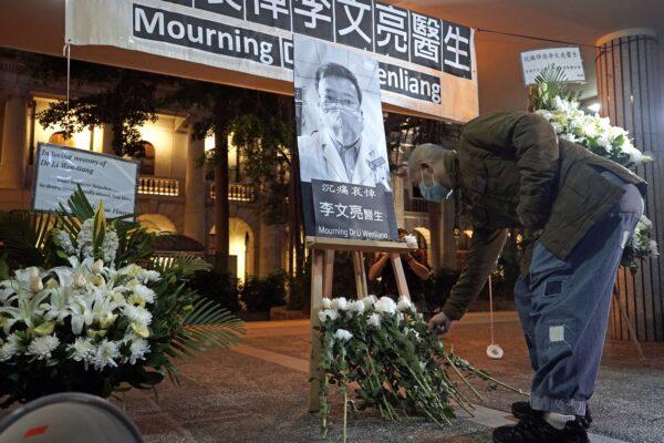 A vigil for Chinese doctor Li Wenliang in Hong Kong on Feb. 7, 2020. (Kin Cheung/AP Photo)