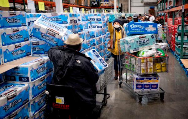 People shop for toilet paper at a Costco store in Novato, Calif., on March 14, 2020. (Josh Edelson/AFP via Getty Images)