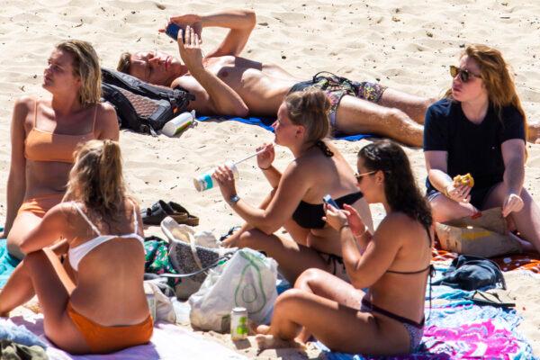 People are seen at Bondi Beach in Sydney, Australia on March 20, 2020. (Jenny Evans/Getty Images)