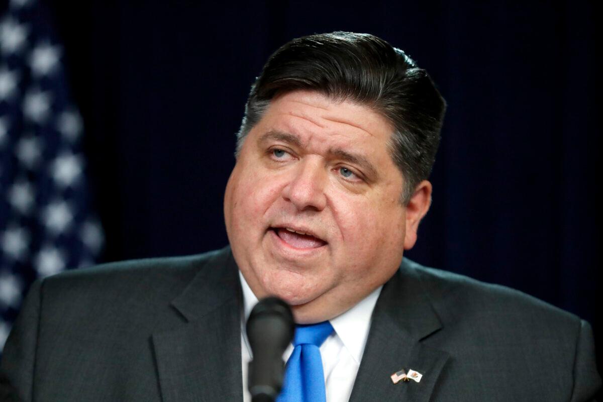 Illinois Gov. J.B. Pritzker announces a stay-at-home rule during the spread of the CCP virus, at a news conference in Chicago on March 20, 2020. (Charles Rex Arbogast/AP Photo)