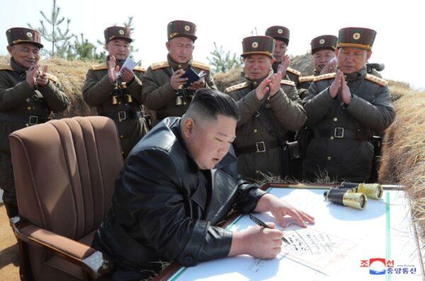 North Korean leader Kim Jong Un guides artillery fire competition in this image released by North Korea's Korean Central News Agency on March 20, 2020. (KCNA via Reuters)