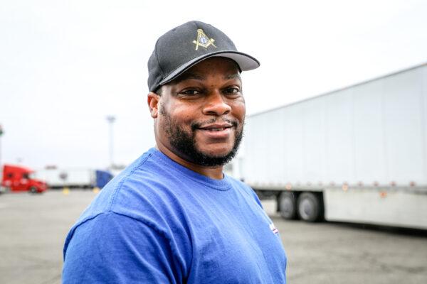 Truck driver Clint Woodard waits for his truck to be repaired at the TA America truck stop in London, Ohio, on March 19, 2020. (Charlotte Cuthbertson/The Epoch Times)