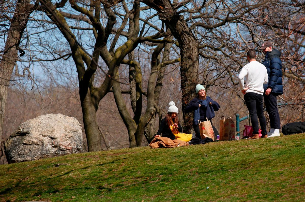 People have a picnic in New York City's Central Park on March 22, 2020. (Keta Betancur/AFP via Getty Images)