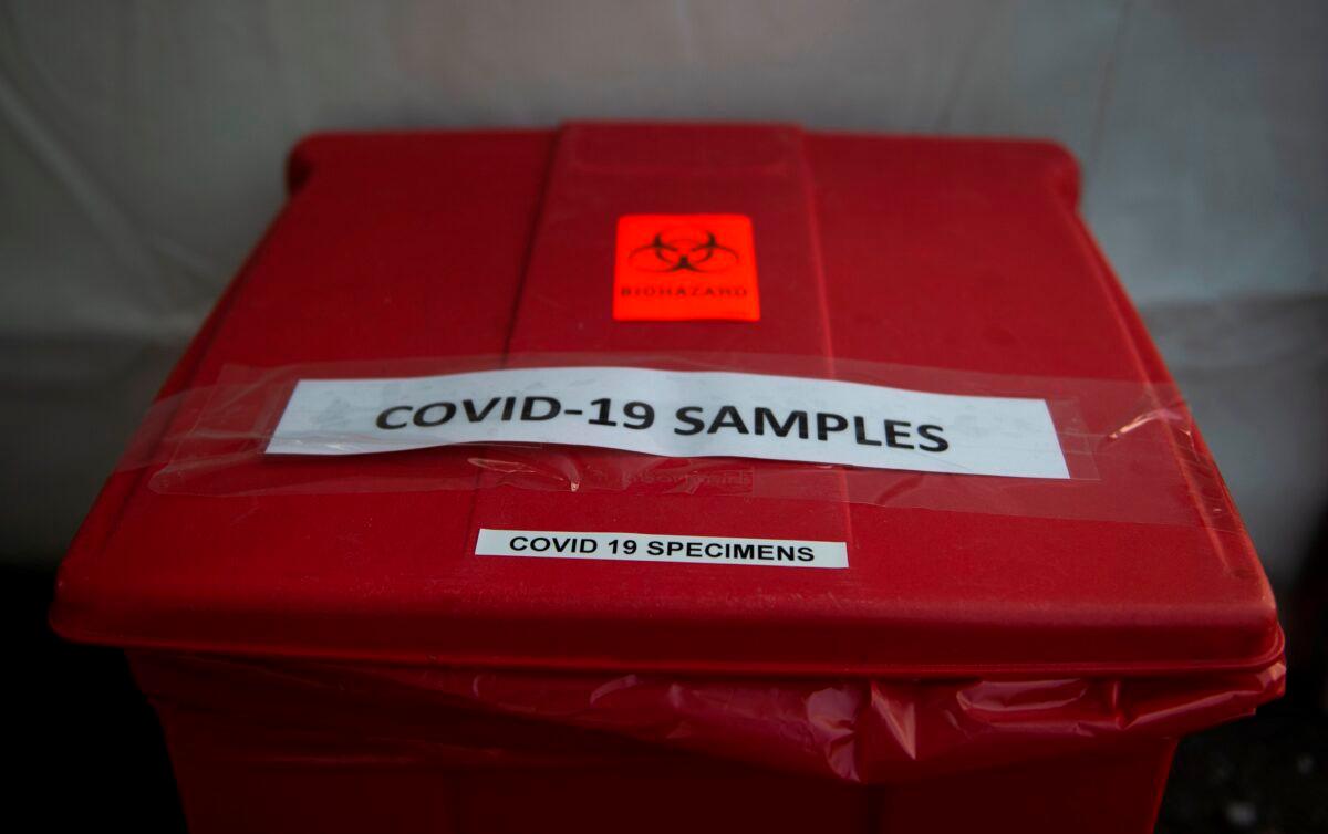 Samples from people tested for COVID-19 at a drive-through coronavirus testing site in Arlington, Virginia on March 20, 2020. (Andrew Caballero-Reynolds/AFP via Getty Images)