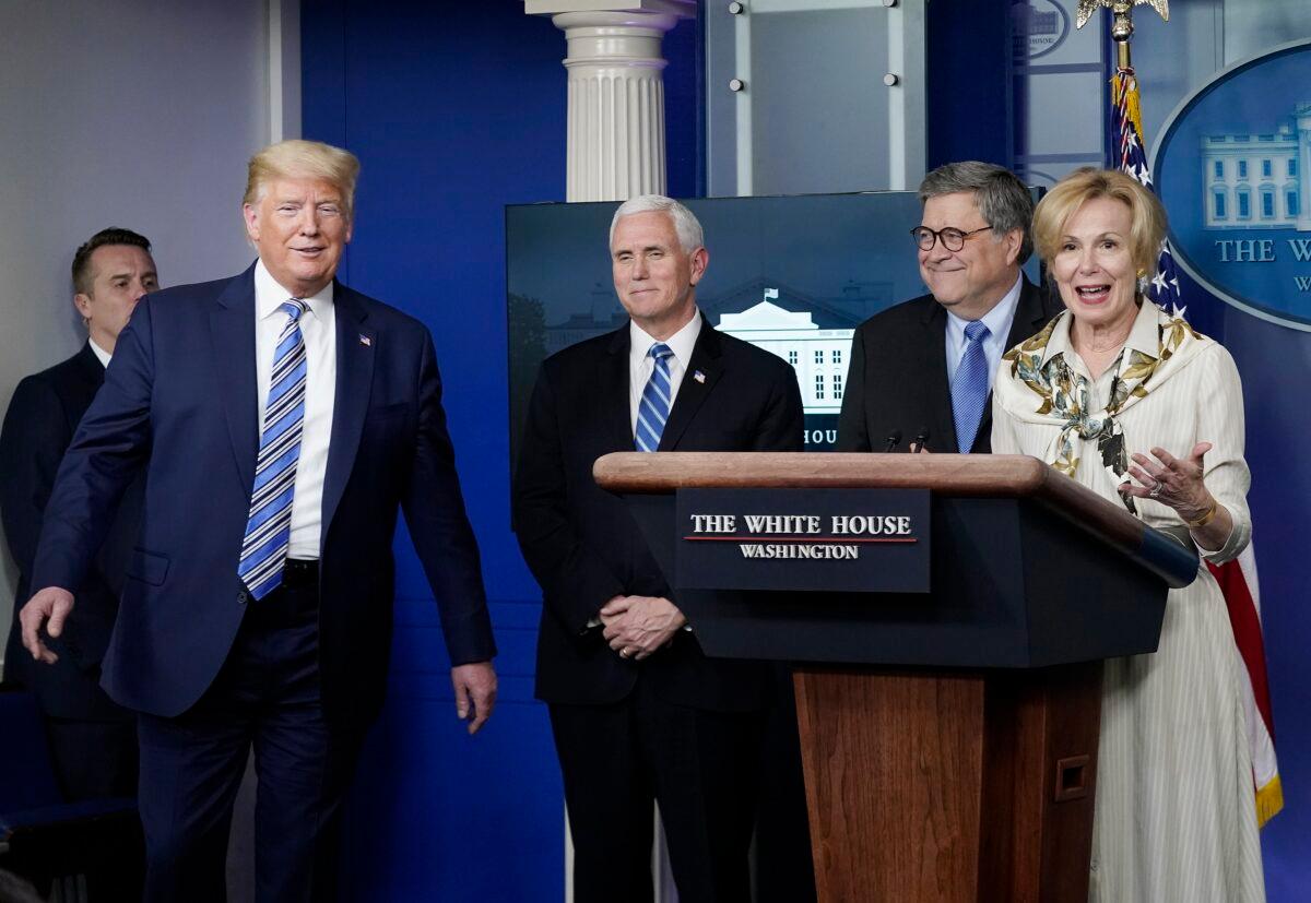 President Donald Trump reacts to White House coronavirus response coordinator Deborah Birx as she speaks at the daily CCP virus briefing at the White House in Washington on March 23, 2020. (Drew Angerer/Getty Images)