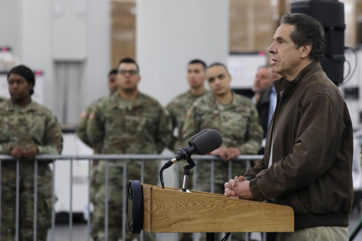 New York Governor Andrew Cuomo speaks to the media and members of the National Guard at the Javits Convention Center which is being turned into a hospital to help fight coronavirus cases in New York City on March 23, 2020. (Spencer Platt/Getty Images)