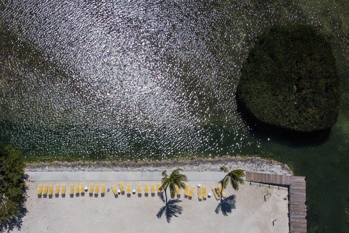 An aerial view of deserted beach resort in Windley Key, some 70 miles south of Miami, on March 22, 2020. The Florida Keys have closed down to visitors amid the spread of the CCP virus. (Chandan Khanna/AFP via Getty Images)