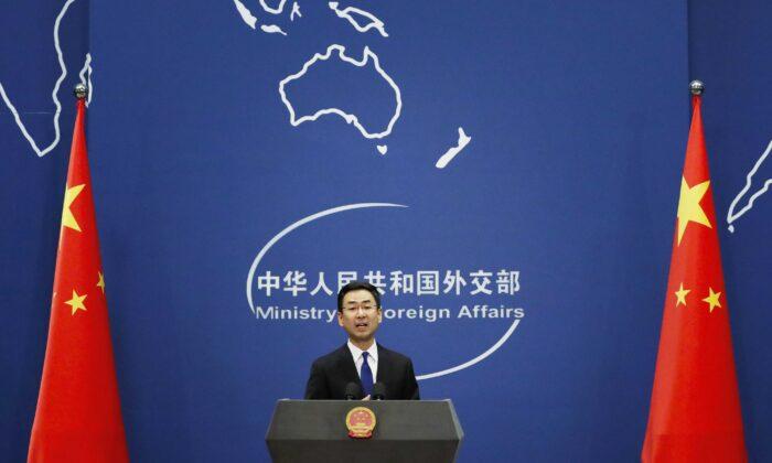 Chinese Foreign Ministry spokesman Geng Shuang speaks during a daily briefing at the Ministry of Foreign Affairs office in Beijing on March 18, 2020. American journalists were expelled from China in retaliation for a new limit imposed by the Trump administration on visas for Chinese state-owned media operating in the United States. (Andy Wong/AP Photo)