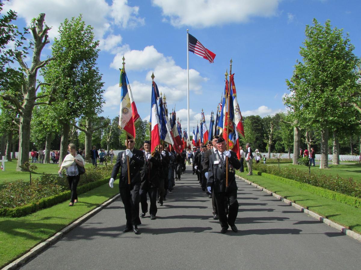 French flag bearers participate in the 2014 Memorial Day Ceremony at Oise-Aisne American Cemetery in France. (American Battle Monuments Commission)