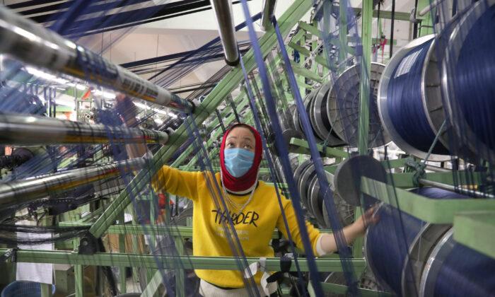 China’s Factories Reopen, Only to Fire Workers as Virus Shreds Global Trade