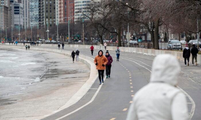 Chicago Officials Threaten Arrests Over Runs, Bike Rides, Basketball Amid COVID-19 Pandemic