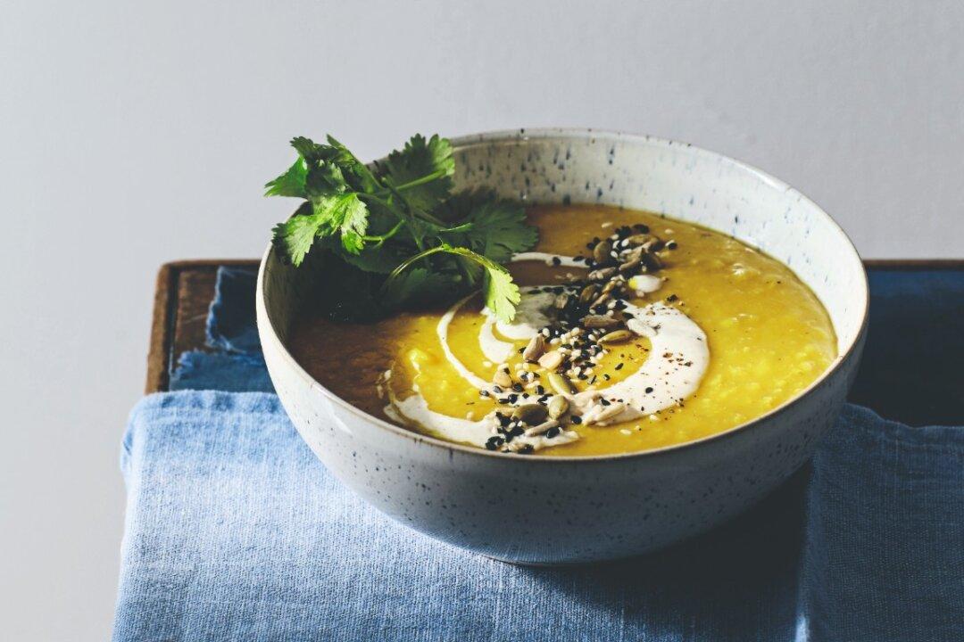 Red Lentil Soup With Turmeric, Masala Yogurt, Toasted Seeds, and Cilantro